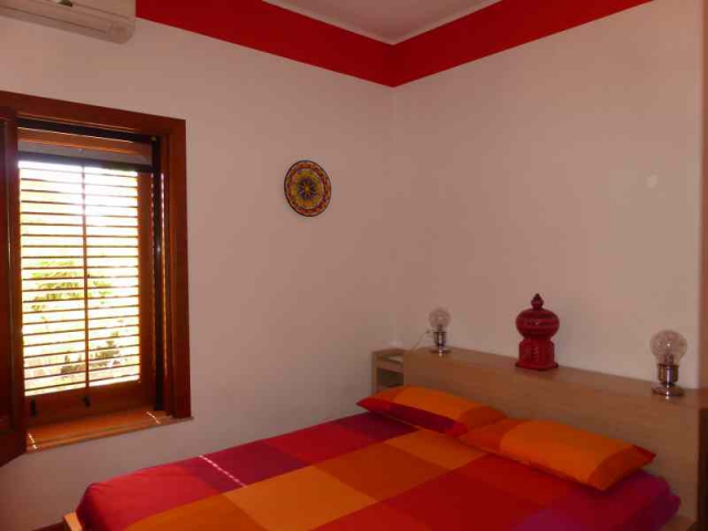 Villa for rent Scopello. View of the red room in Villa Acquamarina Scopello: air conditioner, WiFi. Villa for rent Sicily